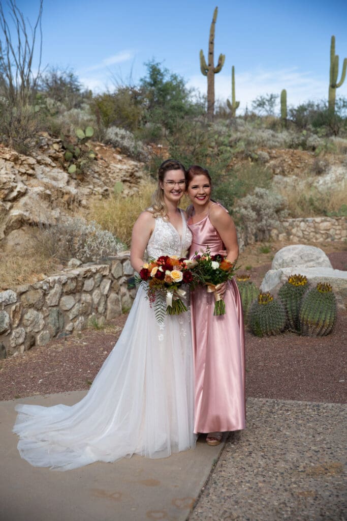 bride with pink bridesmaid dresses
